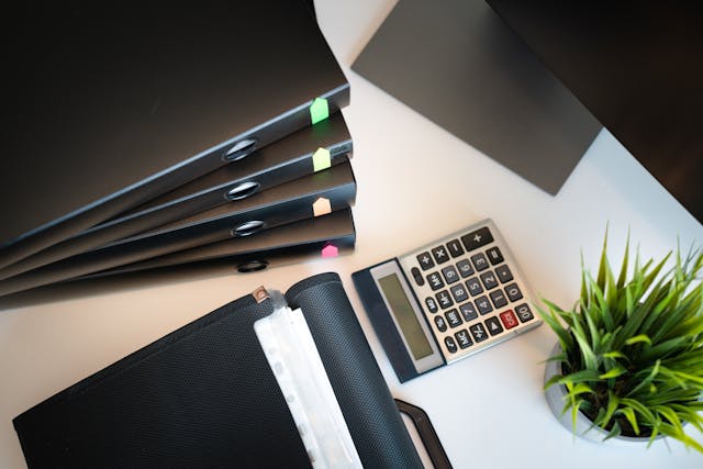Files and calculator on a desk